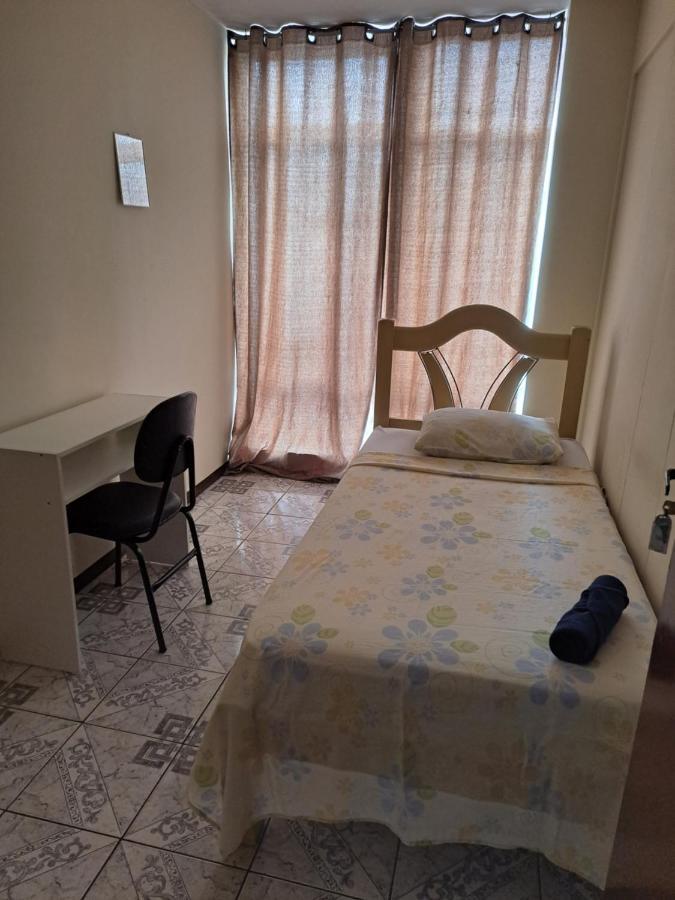 Quarto Individual com Lavabo Compartilhado